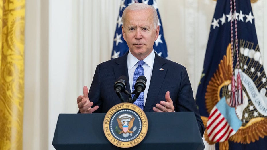 FILE - President Joe Biden, joined by Vice President Kamala Harris, delivers remarks on the Victims of Crime Act Fix to Sustain the Crime Victims Fund on July 22, 2021, in the East Room of the White House. (Official White House Photo by Adam Schultz)