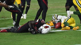 Packers, Cardinals players involved in vicious collision, leave field on carts