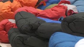 Khris Middleton hands out coats to students as part of '12 Days of Khrismas'