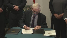 Evers signs 2 bills to support victims, survivors of sexual assault