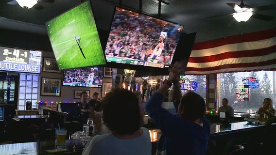 Packers fans celebrate Rodgers' record-setting Christmas game