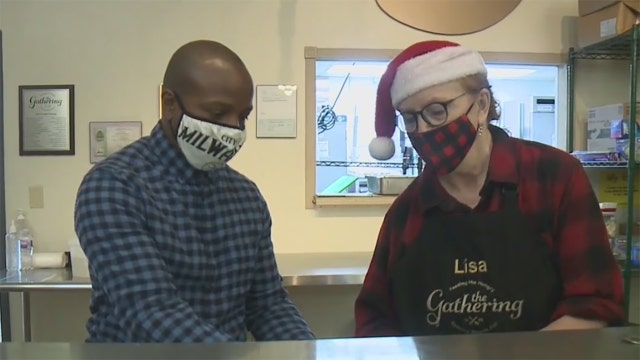 Cavalier Johnson serves Christmas Eve meals for people in need