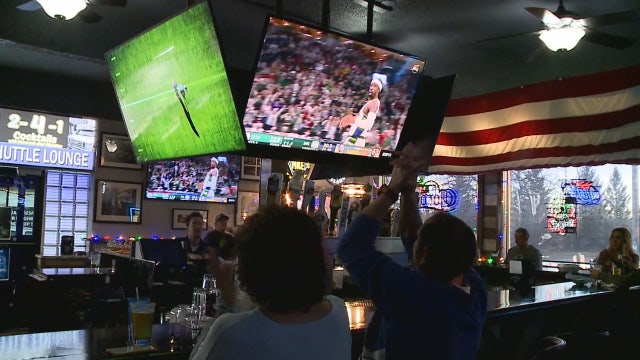 Packers fans celebrate Rodgers' record-setting Christmas game