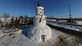 Family builds more than 40 foot tall, super-sized snowman in Milltown, Wis.