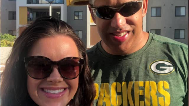 Packers fans cheer from Australia, team united couple