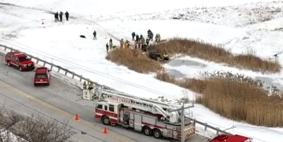 Car in retention pond; Oak Creek emergency responders on scene