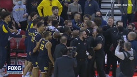 Michigan coach Howard suspended for hitting Wisconsin assistant