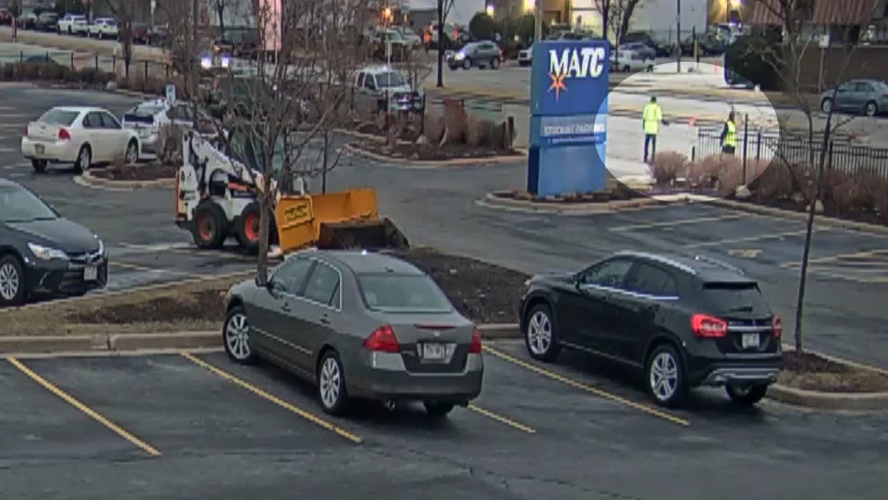 Downtown Milwaukee parking lot scam cars towed after paying