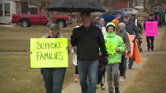 March against Waukesha school merger proposal