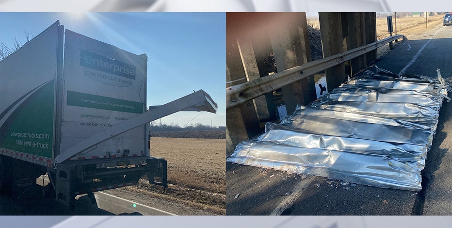 Truck hits Caledonia railroad overpass, loses top: police