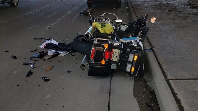 Green Bay police motorcycle struck by SUV; caught on camera