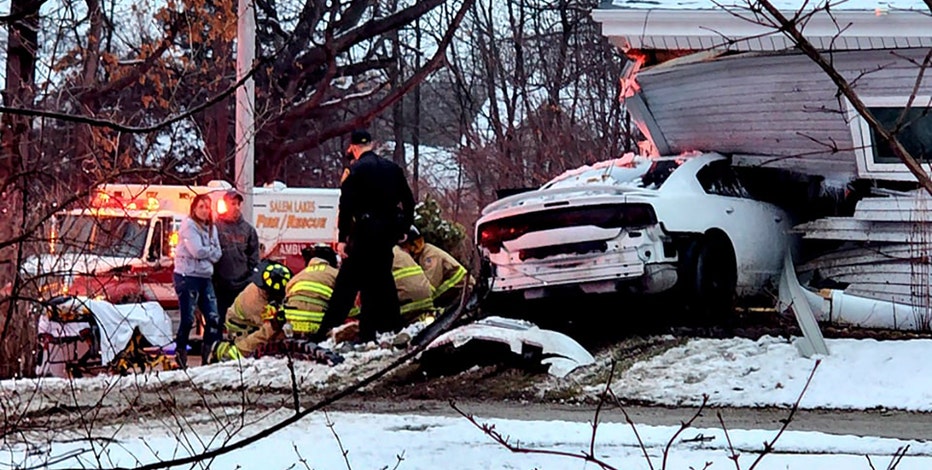 Car crashes into Salem Lakes home, driver injured: sheriff