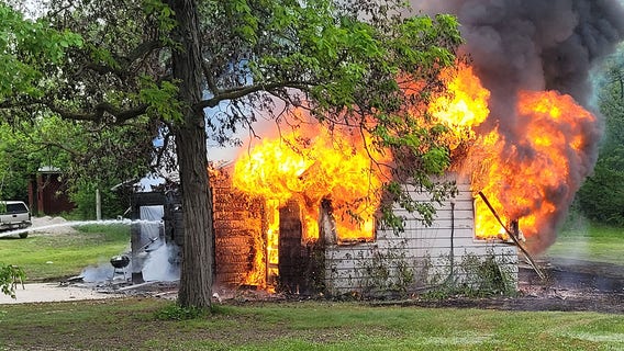 Raymond fire; dog, 2 cats dead