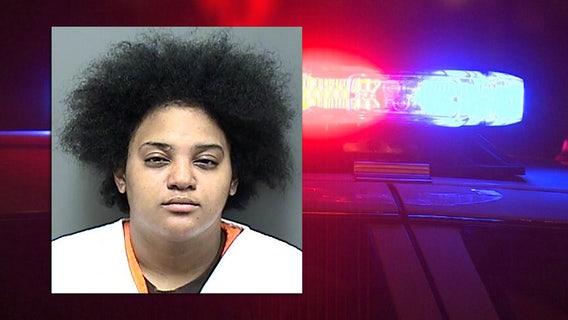 Racine woman accused; striking another woman, infant