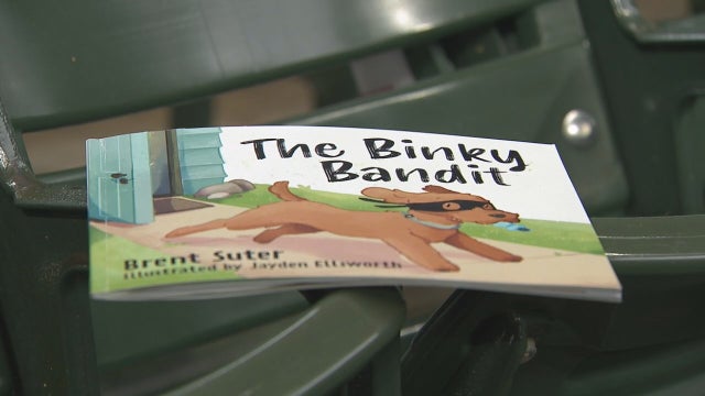 Brewers pitcher Suter answers the call with children's book