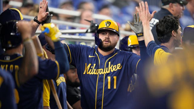 Wong leads Brewers to 7-3 win over the Marlins