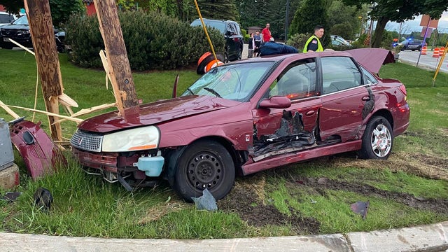 Mequon crash, 2 cars involved, man in handcuffs