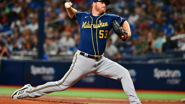 Brewers beat Rays, Woodruff fans 10 in return from IL