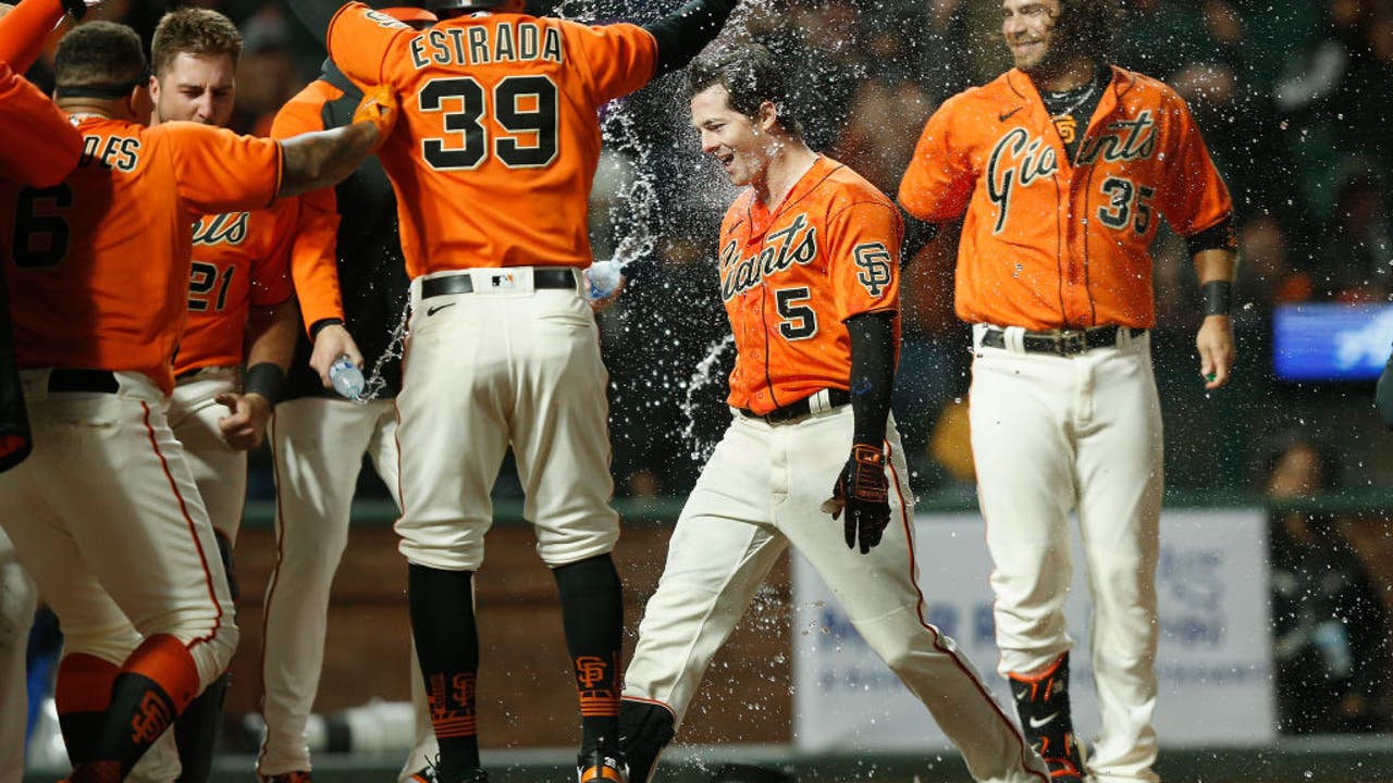 The Giants celebrate in the infield after winning game seven of the News  Photo - Getty Images