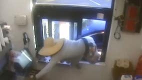 Video: Man climbs into Orlando Wendy's drive-thru window and steals cash, police say