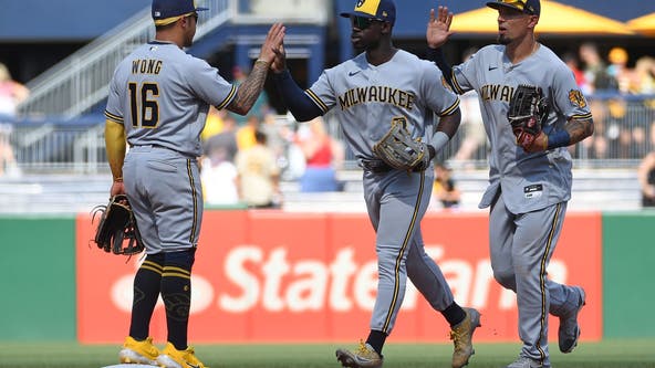 Brewers beat Bucs for series split, Woodruff strikes out 8