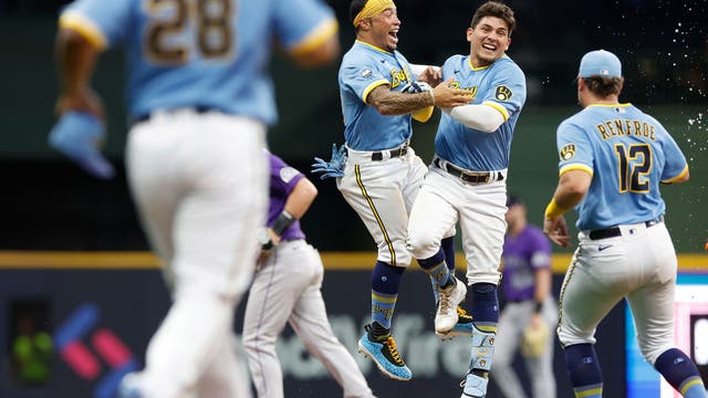 Brewers edge Rockies 6-5 in 13, extend their NL Central lead