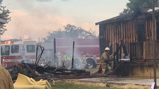 Kansasville fire at mobile home center; 1 injured, pet dead