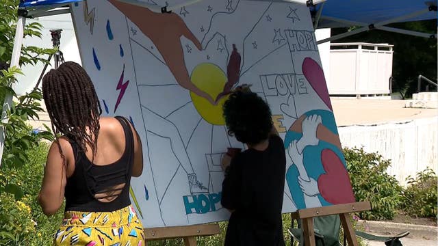 Community COVID vigil in Milwaukee offers hope, chance to reflect