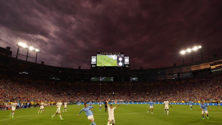 Soccer at Lambeau Field: Storms delay, Manchester City prevails