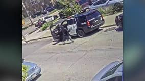 Milwaukee police officer injured, squad smashed: video