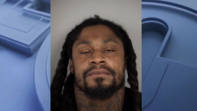 marshawn lynch booking photo