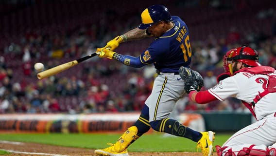 Brewers beat Reds, Kolten Wong homers 3 times