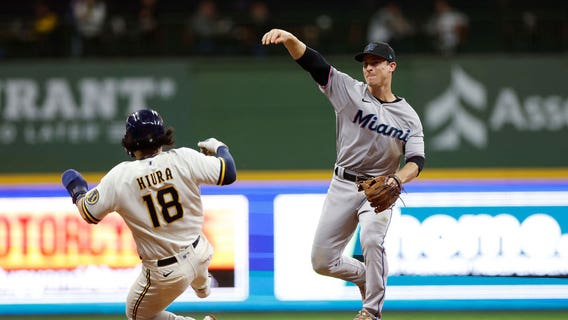 Marlins beat Brewers with grand slam, 4-2
