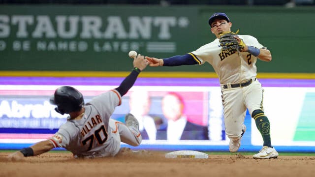 Brewers complete Giants DH sweep; Peralta exits early