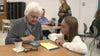 Lessons in technology; roles reversed as students teach seniors