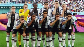 Germany players cover mouths at World Cup in FIFA protest