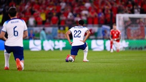 England and Wales players take a knee in World Cup match