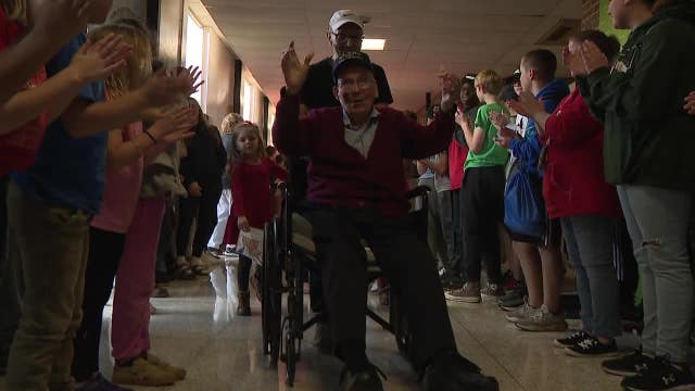 Racine school honors WWII veteran, 101, on Veterans Day eve