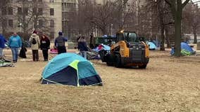 Abandoned tents in MacArthur Square removed, homeless moved indoors