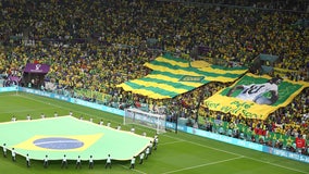 Brazil fans at World Cup game salute soccer great Pelé