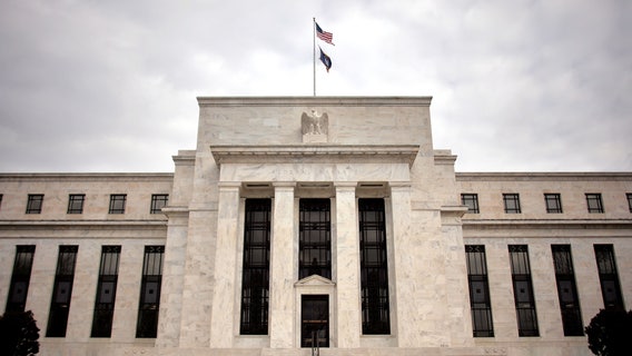 Fed raises key interest rate by half a point, signals more to come