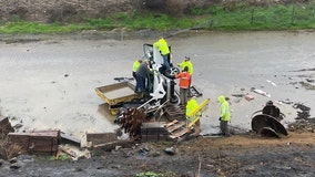 We Energies rescues a woman after she drove off a 75-foot embankment