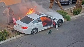 Video: Driver rescued from car seconds before it erupts in flames on Vegas strip