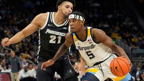 Marquette holds off Providence, 83-75