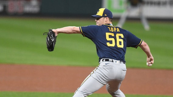 Brewers trade pitcher Justin Topa to Mariners