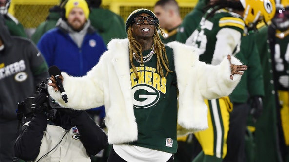 Packers fan Lil Wayne showcases new apparel from NFL, Drake's OVO