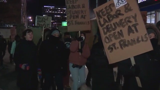 Milwaukee St. Francis labor/delivery closed, protest outside exec's home