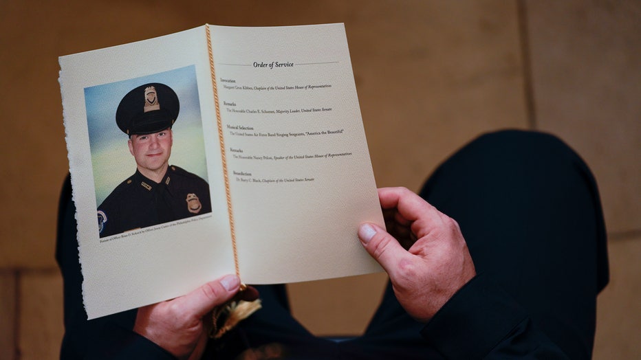 Capitol Police Officer Brian Sicknick Lies In Honor At U.S. Capitol