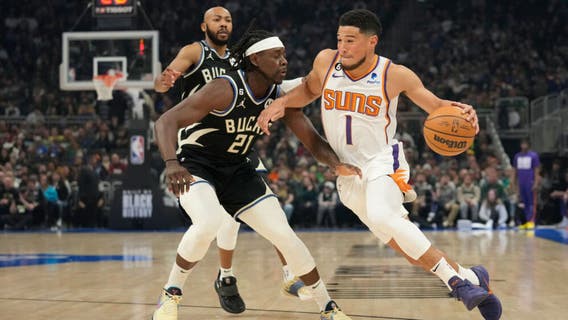 Milwaukee Bucks beat Suns, 14th-straight win