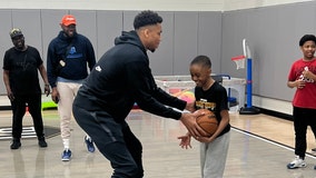 Giannis Antetokounmpo, kids play basketball at Bucks star's home